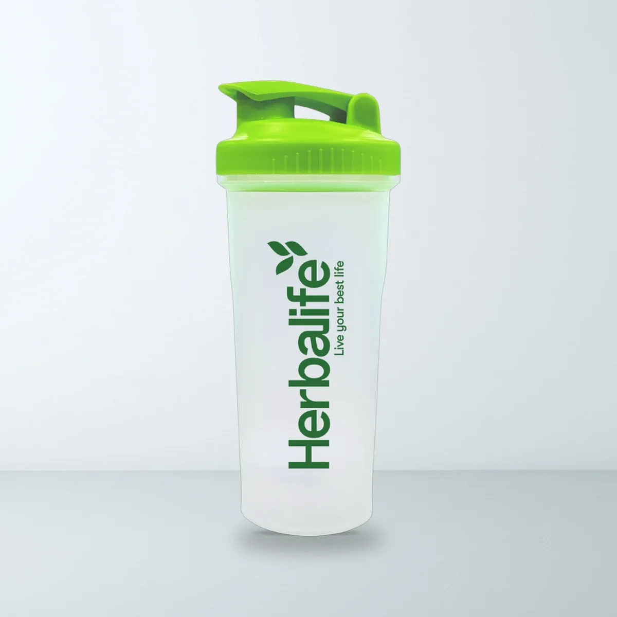 Bình Lắc Shake Herbalife 600ml Bình lắc Shake Herbalife bằng nhựa trắng mờ nắp bật màu xanh lá in chữ Live your best life
